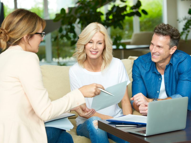 an advisor engaging with a client couple