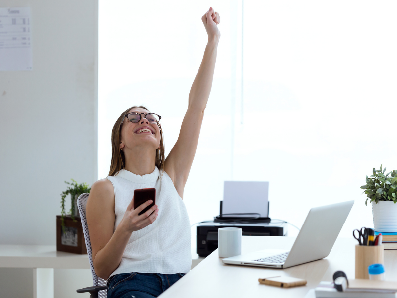 female advisor celebrating successful lead