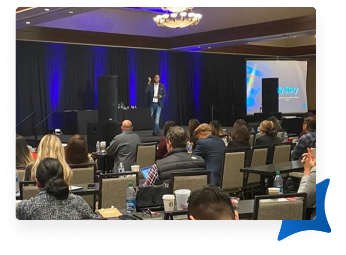 Akil from Bluemind speaking in a conference